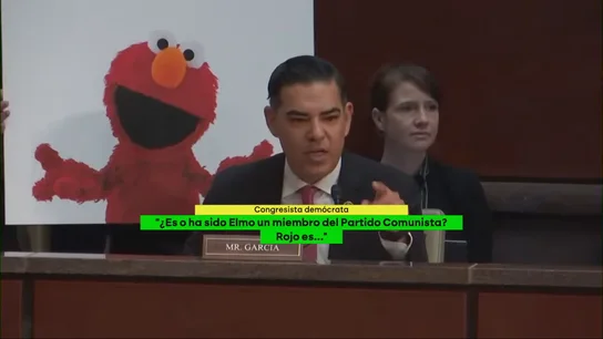 Un congresista demócrata con un cartel de Elmo, de Barrio Sésamo Un congresista demócrata con un cartel de Elmo, de Barrio Sésamo