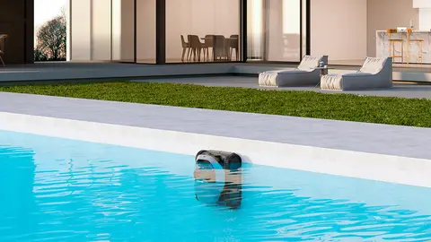 El Dreame Z1 regresa a su base en el lateral de la piscina El Dreame Z1 regresa a su base en el lateral de la piscina