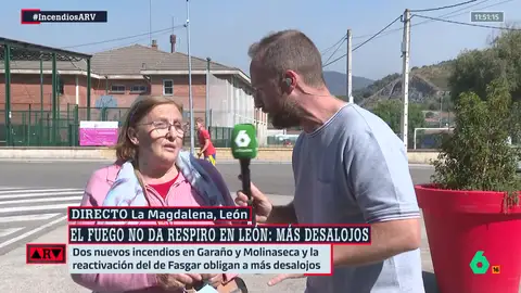Nieves, vecina desalojada por los incendios: "Siempre ha habido alguno, pero ahora con tanta maleza y la sequía es peor" Nieves, vecina desalojada por los incendios: "Siempre ha habido alguno, pero ahora con tanta maleza y la sequía es peor"
