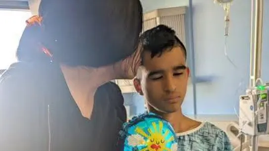 Emmanuel González García, con su madre Emmanuel González García, con su madre