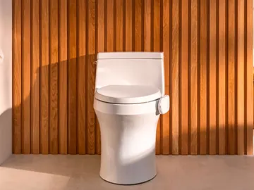 Un inodoro con DEKODA instalado Un inodoro con DEKODA instalado