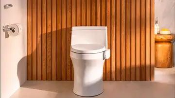 Un inodoro con DEKODA instalado Un inodoro con DEKODA instalado