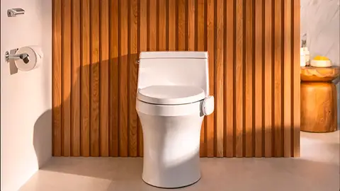 Un inodoro con DEKODA instalado Un inodoro con DEKODA instalado