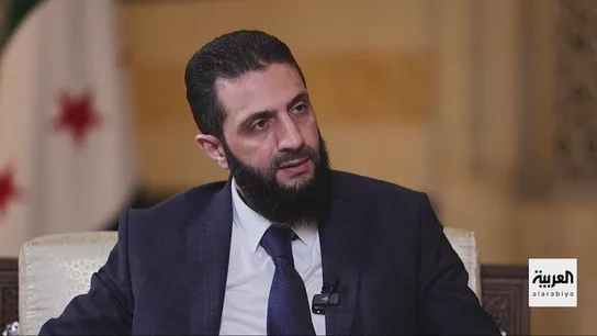 Ahmed al Sharaa en una entrevista de televisión. Ahmed al Sharaa en una entrevista de televisión.