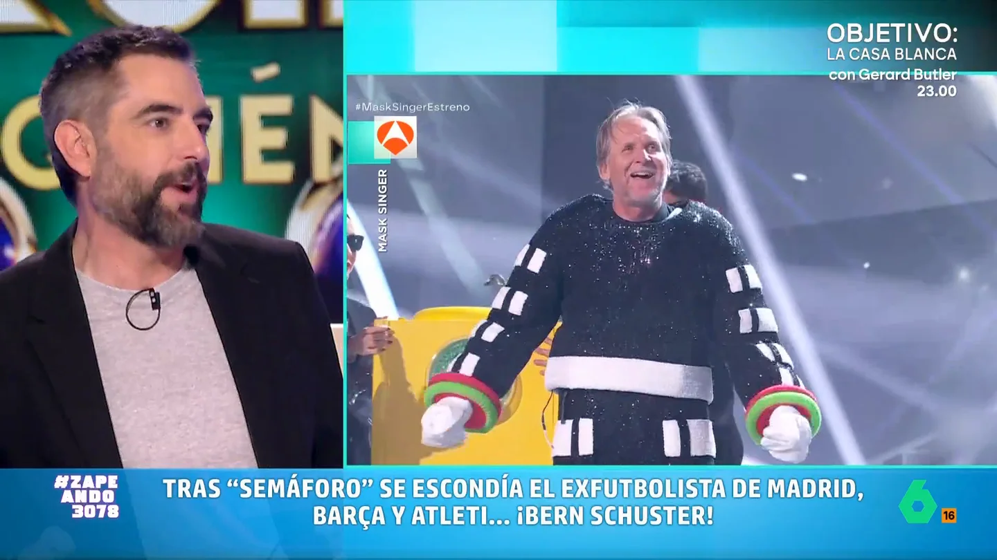 Dani Mateo reacciona a la revelación de Bernd Schuster en 'Mask Singer': "He visto a poca gente cantar tan mal" Zapeando analiza las dos primeras revelaciones de la nueva temporada de 'Mask Singer': 'Micrófono', que resultó ser Elle Macpherson y 'Semáforo', tras el que se escondía Bernd Schuster. Sus reacciones, en este vídeo.