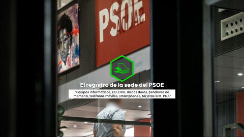 Un agente de la UCO dentro de la sede del PSOE en Ferraz