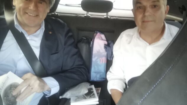 Carles Puigdemont, junto a Jordi Turull